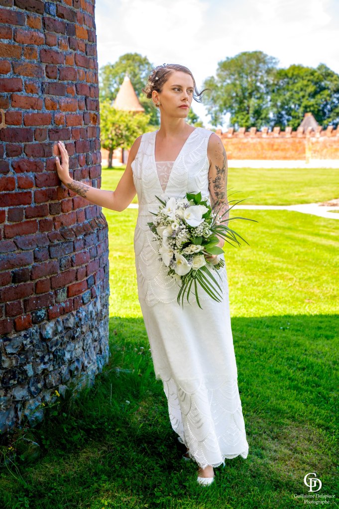 Robe année 20, réalisée en crêpe satiné et tulle brodée sequin.