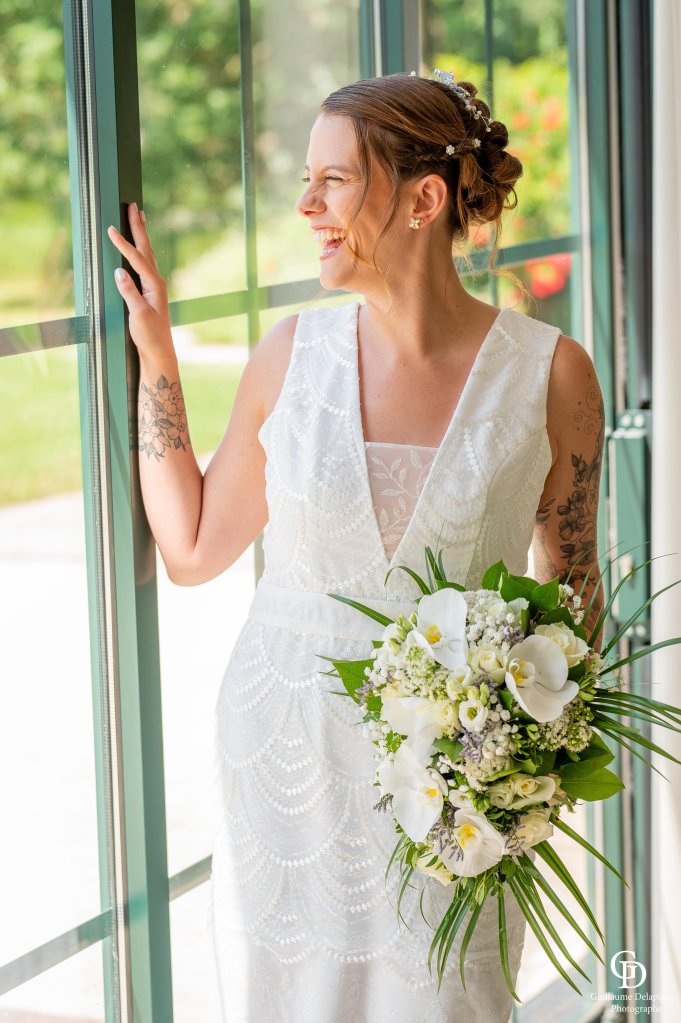 Robe année 20, réalisée en crêpe satiné et tulle brodée sequin.